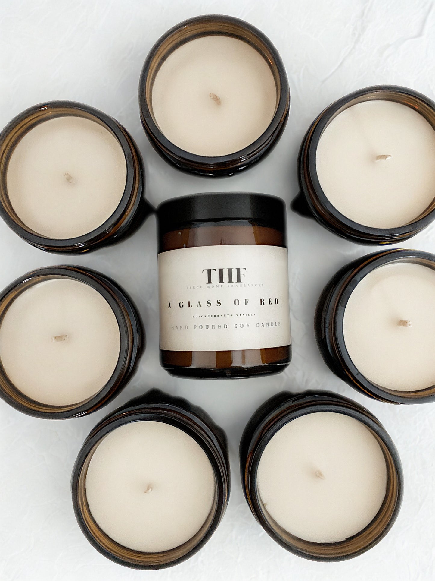 A glass of red candle