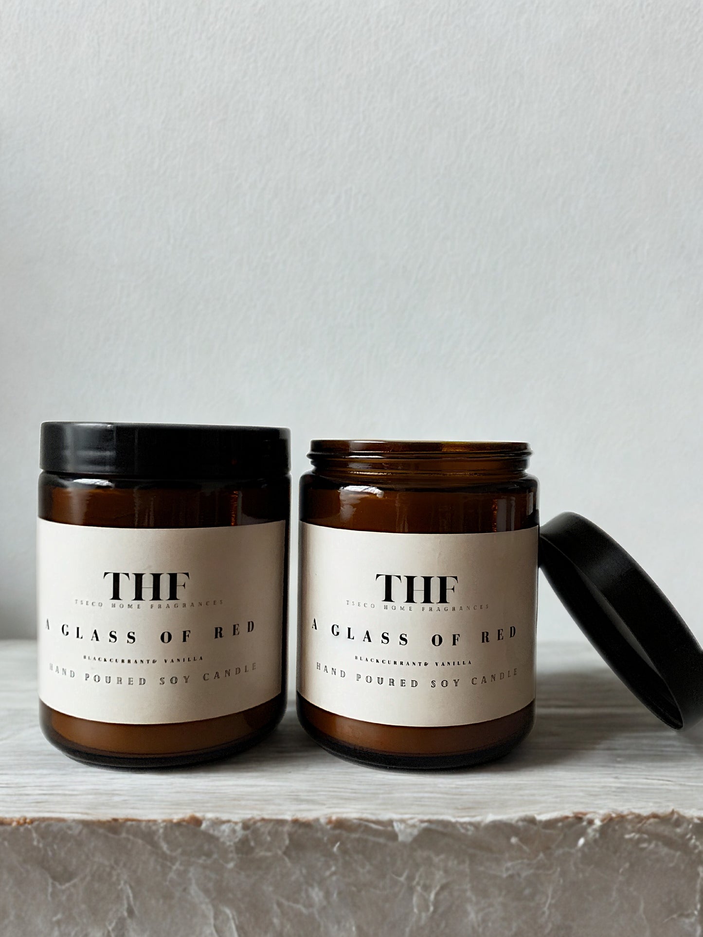 A glass of red candle